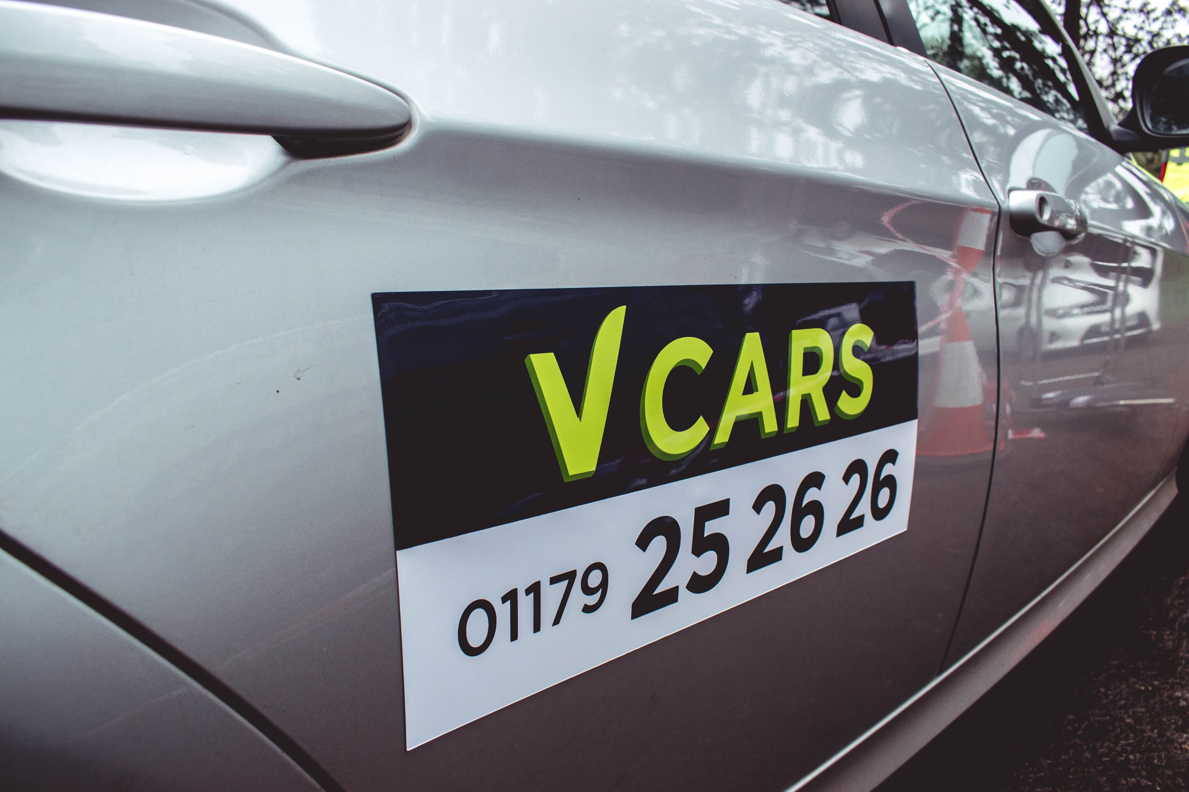 V Cars Door Sign